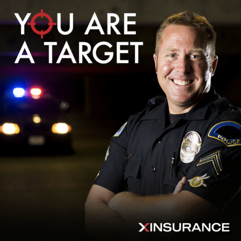 You are a target for police officer liability insurance | Police officer in uniform headshot | liability insurance for police officers